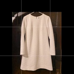 White long sleeve event dress w/ black back zip